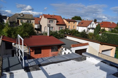 Prodej podkrovního bytu s garáží a terasou v rodinném domě, Kladno Rozdělov
