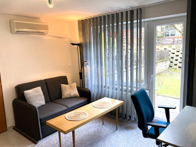 Pronájem bytu 1+1 22m2 se zahradou 60m2, ul. Pelušková Praha 9 - Kyje